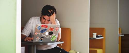 Person with head in hands because of lousy customer service